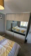 Navara Ash quarter panels with mirrors filling the middle that can be used as full length dress mirror no matter where you stand, fitted in Wolviston